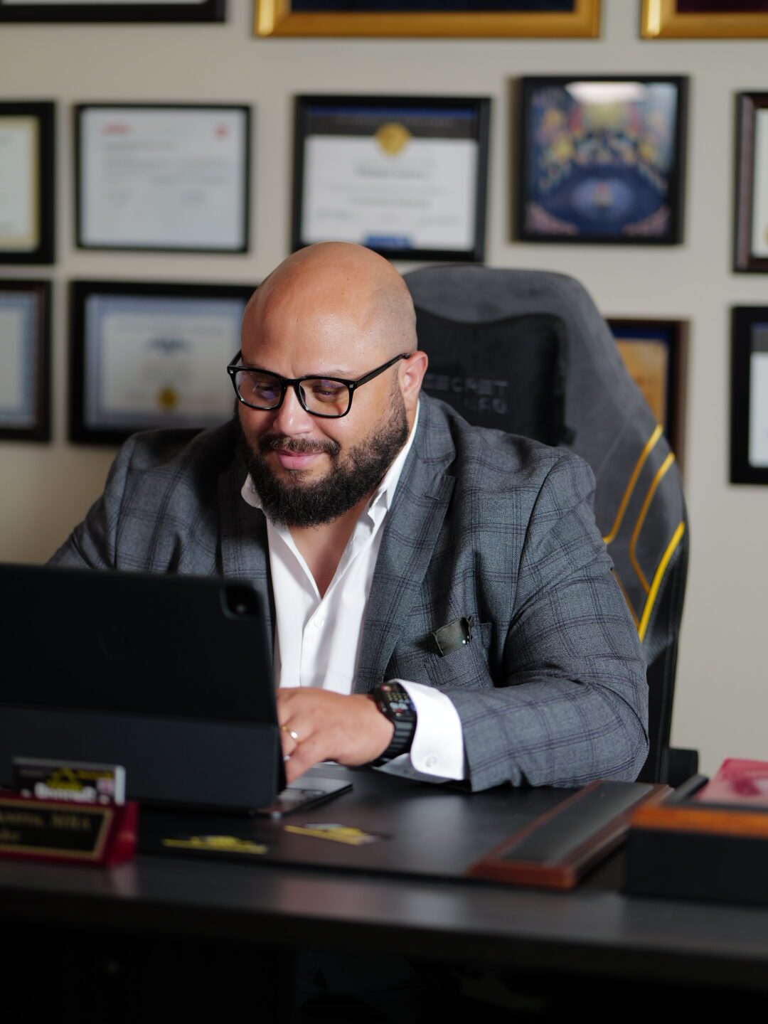 Michael Acerra, licensed Texas public adjuster, reviewing a claim file at his San Antonio office